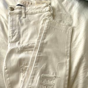 White distressed denim jeans